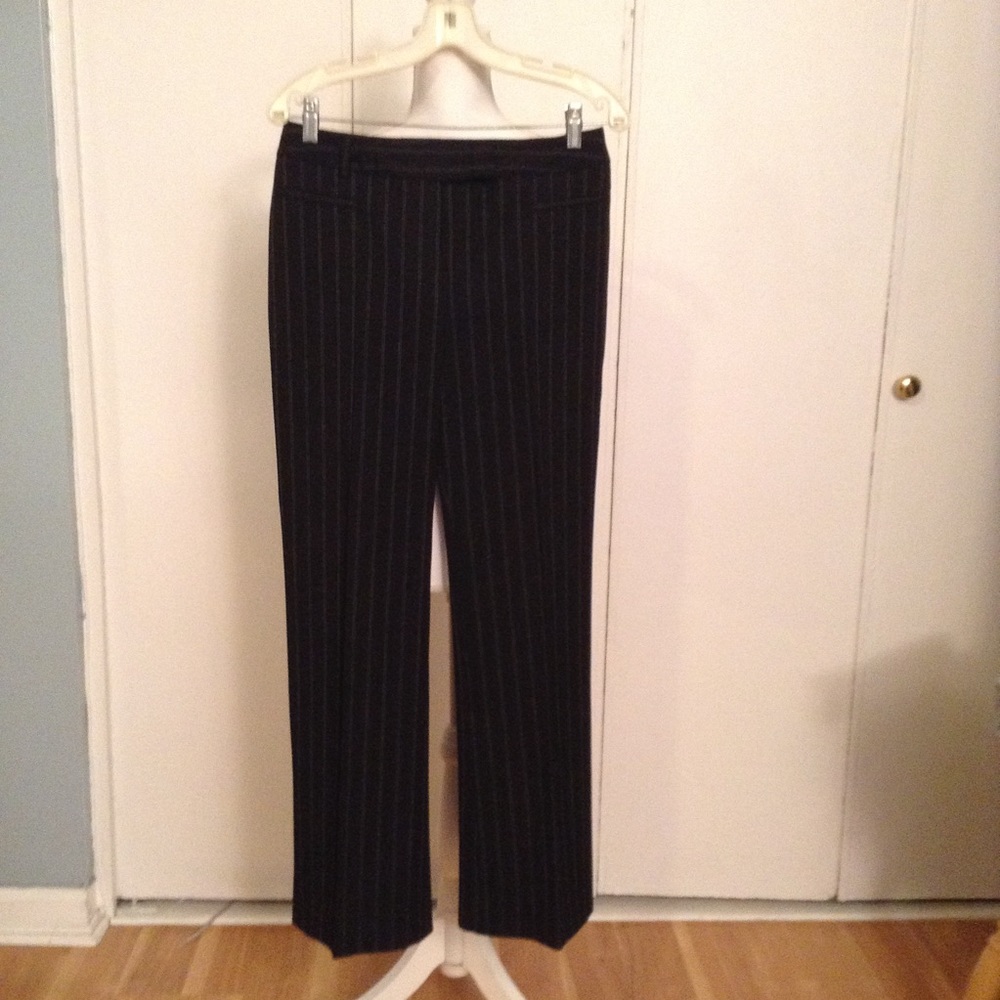 Black pinstriped slacks. Very sharp. Size 4